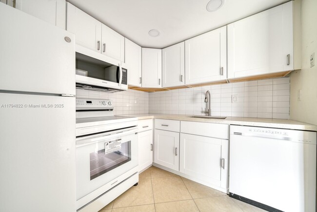 Photo - 496 NW 165th St Condo Unit D-316