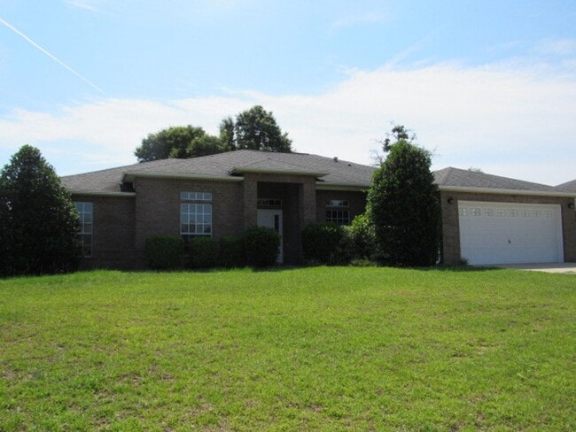 Building Photo - Four bedroom home near Whiting Field!