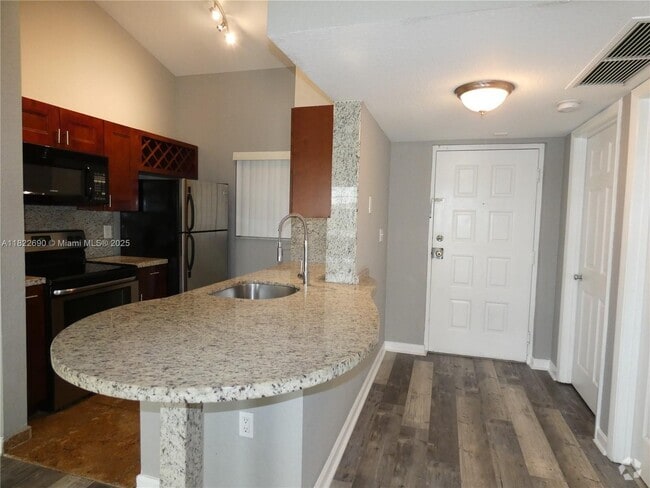 Building Photo - 2850 N Oakland Forest Dr Unit 304 Rental