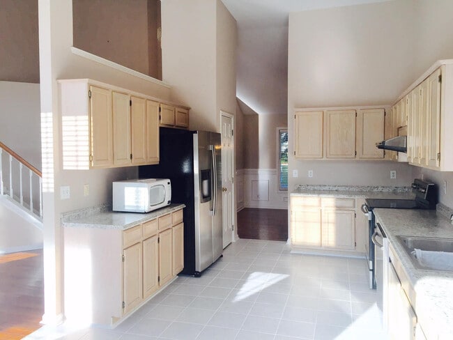 Photo - Elegant 4 Bedroom 2.5 Bath House w/ Primary Suite on 1st Floor + a Fenced-in Backyard @ Park Vill...