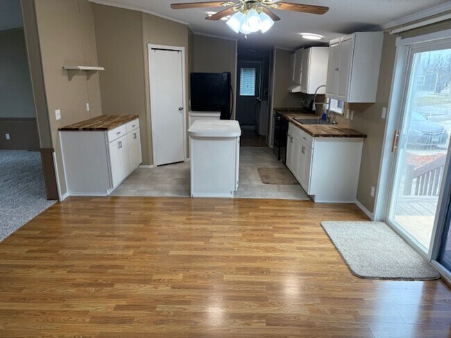 Photo - Spacious 4-Bedroom Home Available NOW in Skyway Park Village!