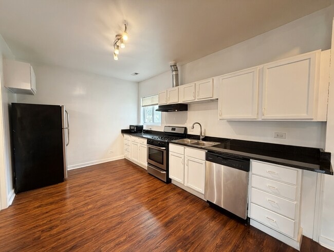 Photo - 5833 W Irving Park Rd Unit 1F