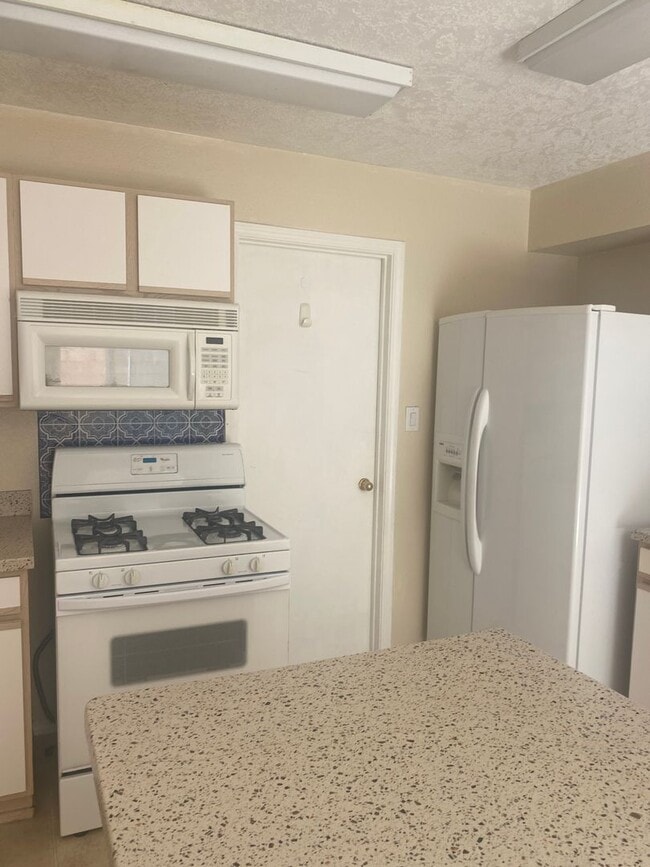 Photo - COMING SOON - 3 Bedroom 2.5 Bath Located in the NE Heights!