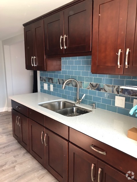 Kitchen sink side - 7837 Quince St Rental