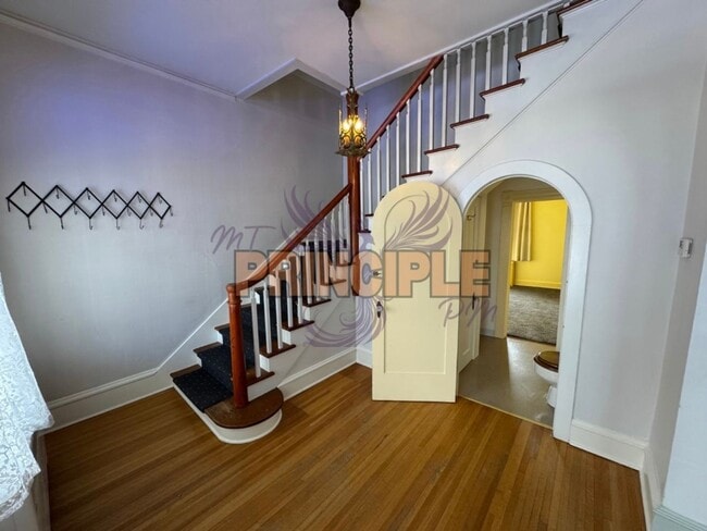 Photo - Charming Three-Bedroom Home with Garage and Yard