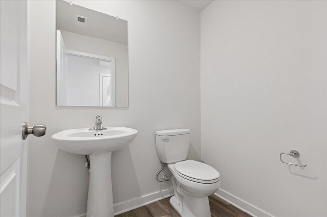 Photo - COMING SOON! Brand New River Pointe townhome with modern finishes, flexible living space, and a p...