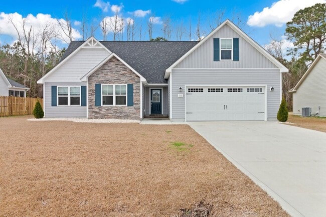 Building Photo - Minutes to Back Gate & Beaches!