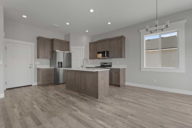 Photo - NEW HOME with large garage stalls and unfinished basement for additional storage