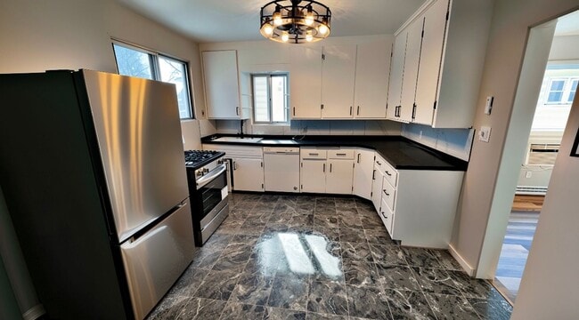 Photo - Charming Newly Renovated 3-Bedroom Rental with Garage & Basement