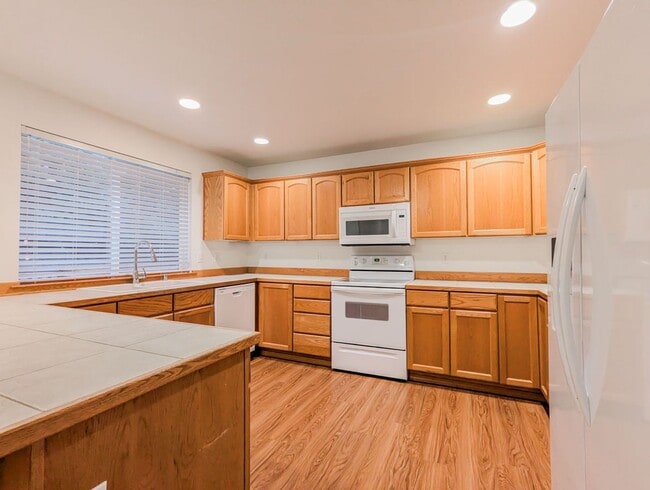 Photo - **Move-in Special!!!** Spacious 4 bd, 2.5 ba with 2 car garage and fenced yard!