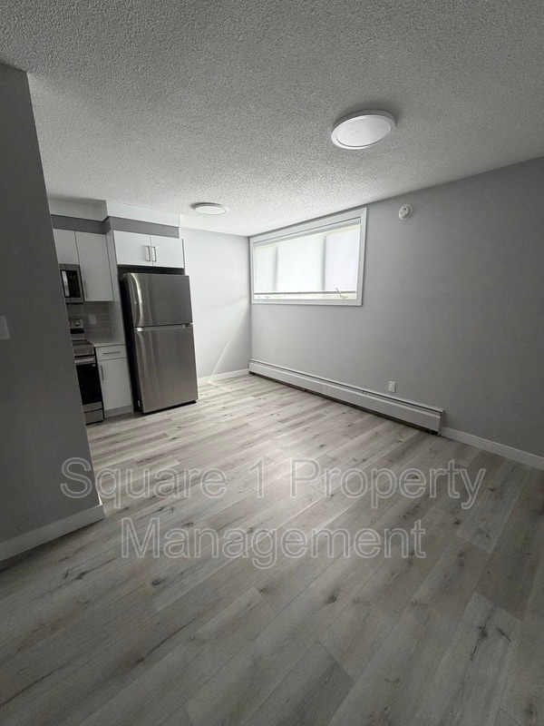Photo - 10731-10785 85 Ave