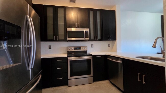 Building Photo - 17820 NW 73rd Ave Unit 203-1