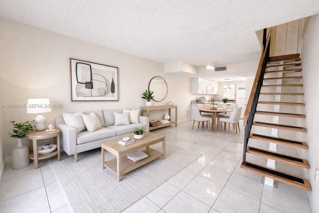 Building Photo - 5575 W 26th Ct Unit 203