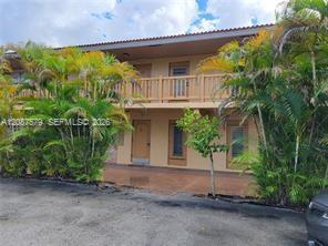Building Photo - 8704 NW 35th St Unit 105