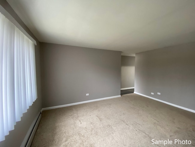 Photo - Carriage House Apartments LLC