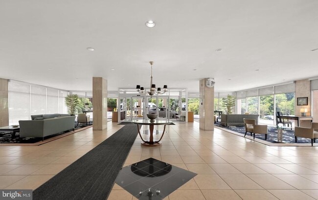 Building Photo - 10401 Grosvenor Pl Unit 328