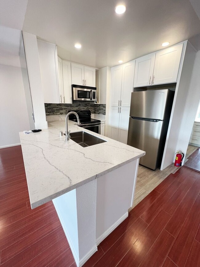 Building Photo - Spacious 2 Bed/2 Bath Condo at Mission Gre... Unit 198