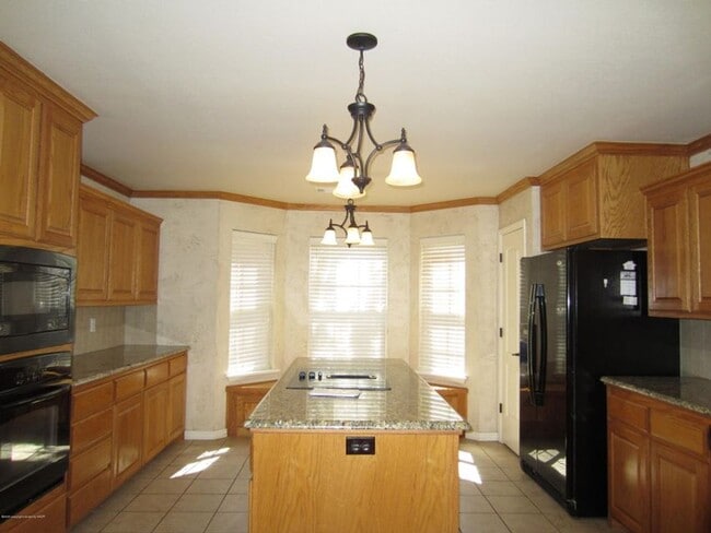 Photo - Located in City View 3/2/3 car garage