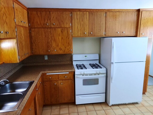 Full size gas stove, newer fridge - 1665 10th Ave Unit Apt #4