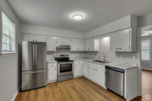 Building Photo - NEWLY UPDATED. AVAILABLE NOW. 2 BD 1 1/2 B... Rental