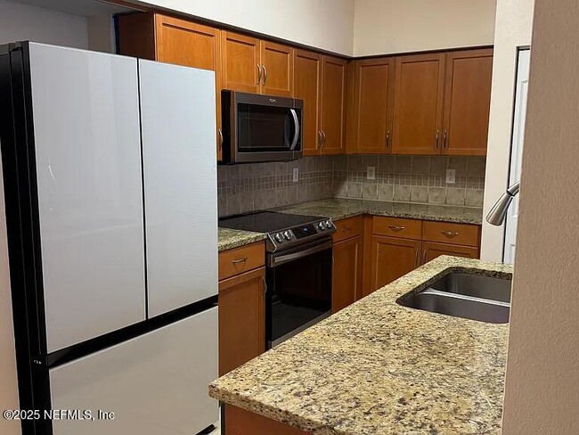 Photo - 10435 Mid Town Pkwy Condo Unit 206