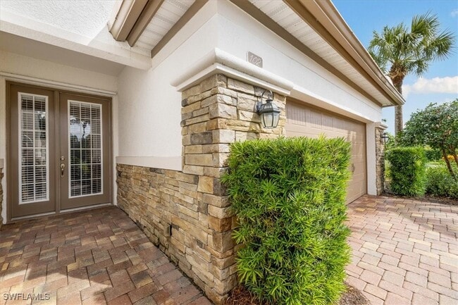 Building Photo - 8051 Players Cove Dr Unit 102