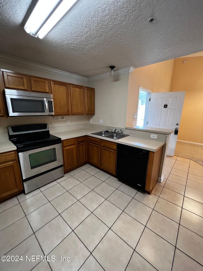 Photo - 7920 Merrill Rd Unit 1916