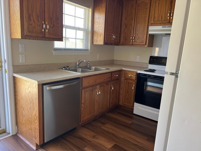 Kitchen with utility room attached - 25585 Nick Davis Rd Unit #9