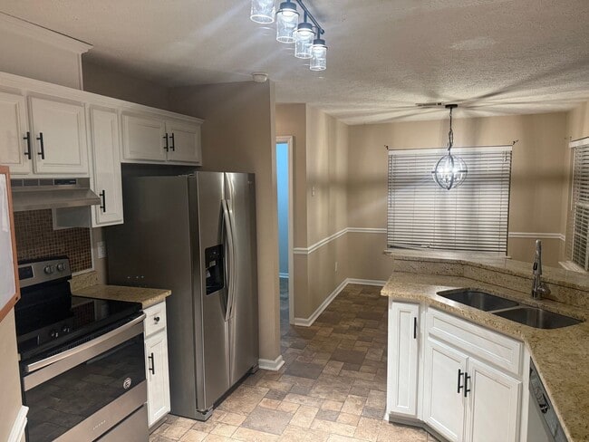 Photo - Closest 3bed/2bath to gate 2 available with Fenced in yard.