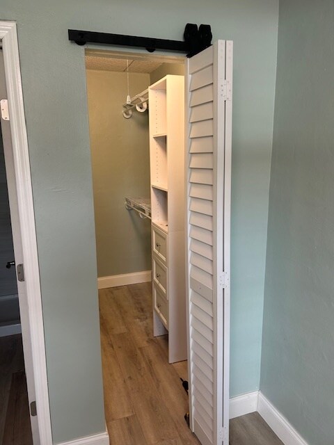 Large walk-in closet with newly installed shelving & storage - 3211 SW 44th St Unit #105