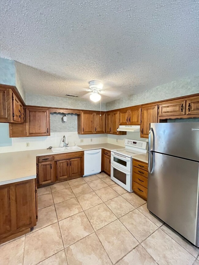 Photo - 4 bedrooms and 2 bath home, mature neighborhood, garage, well built and clean