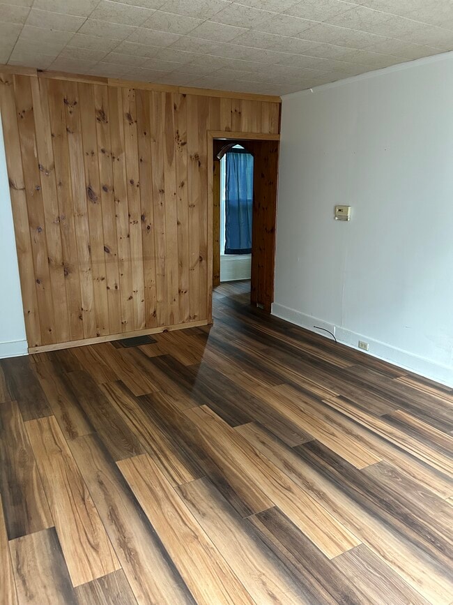 Part of living room - 7614 Collins St Unit #1 downstairs