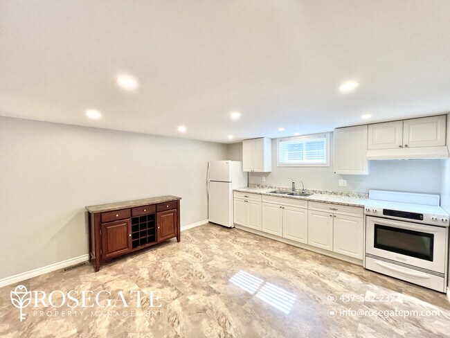 Photo - Spacious 1-Bedroom Basement Apartment in P... Unit 2