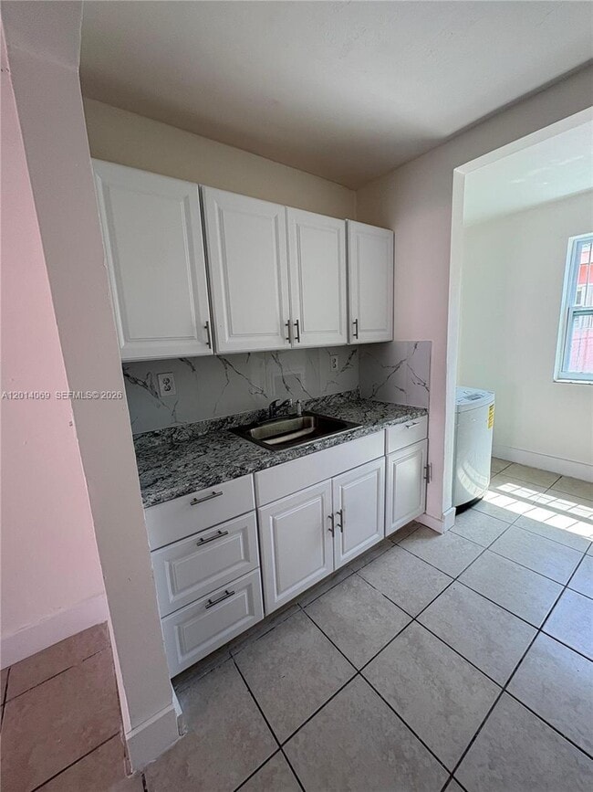 Photo - 1491 NW 56th St Unit 1493
