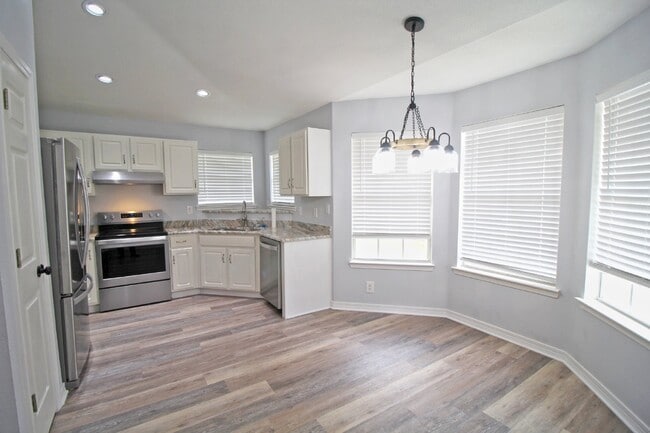 Photo - Updated Fox Hollow 3BR Home Near 9 Mile Rd with LVP Flooring, Granite Kitchen, 2-Car Garage & Fen...