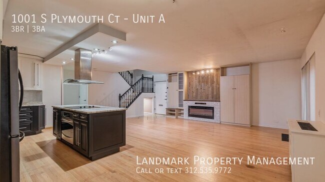 Photo - 1001 S Plymouth Ct Unit A Unidad A