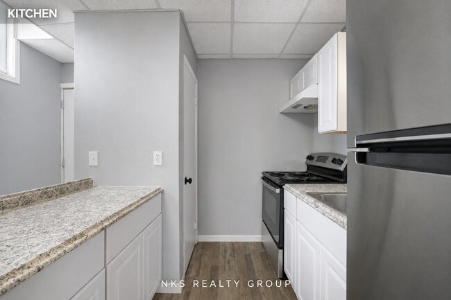 2718 E Grand River Ave Unit 2 private 1BR 1BA