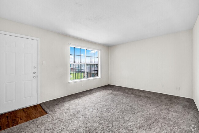 2BR, 1.5BA - 870SF - Living Room