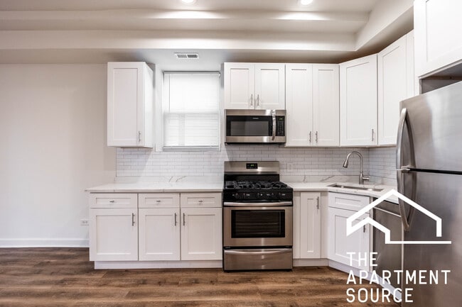 Building Photo - 2112 N Campbell Ave Unit GDN