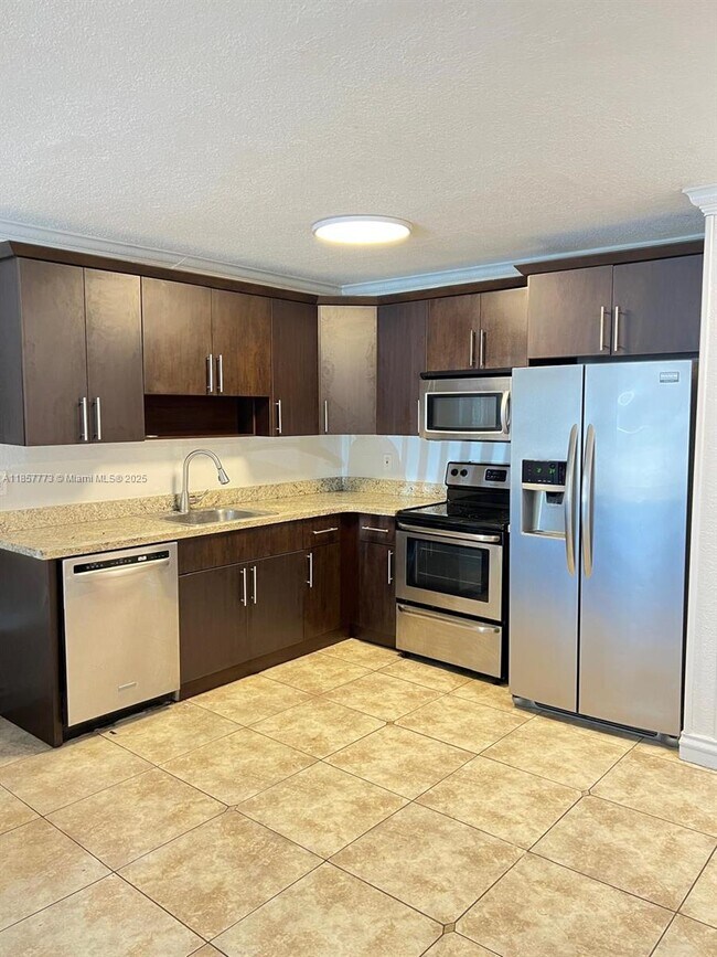 Building Photo - 7010 NW 186th St Unit 5-117 Rental