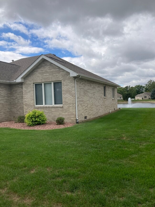 Side View & Fountain View - 412 11th Cir SE Unit Iron Lake Estates