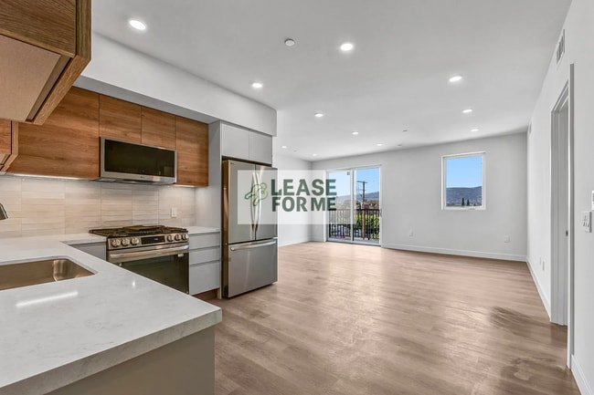 Building Photo - 8867 Alcott St Unit 401