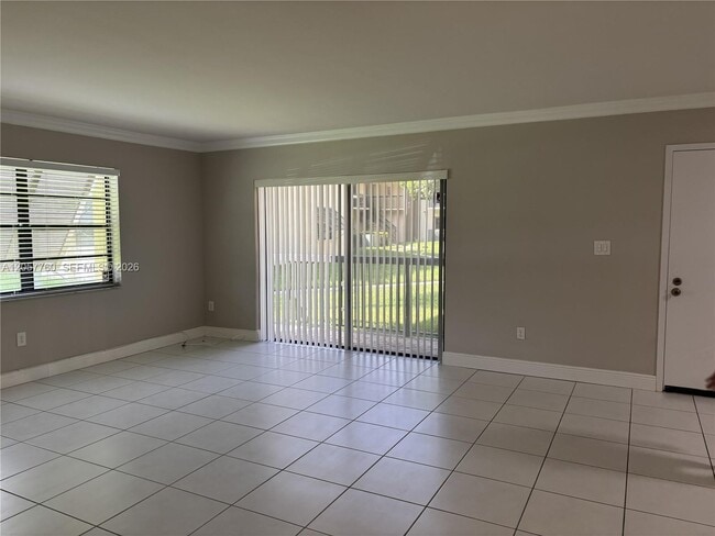 Building Photo - 7965 SW 86th St Unit 105