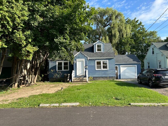 Photo - Lovely Home! Spacious home! Large front & back yard! Garage!