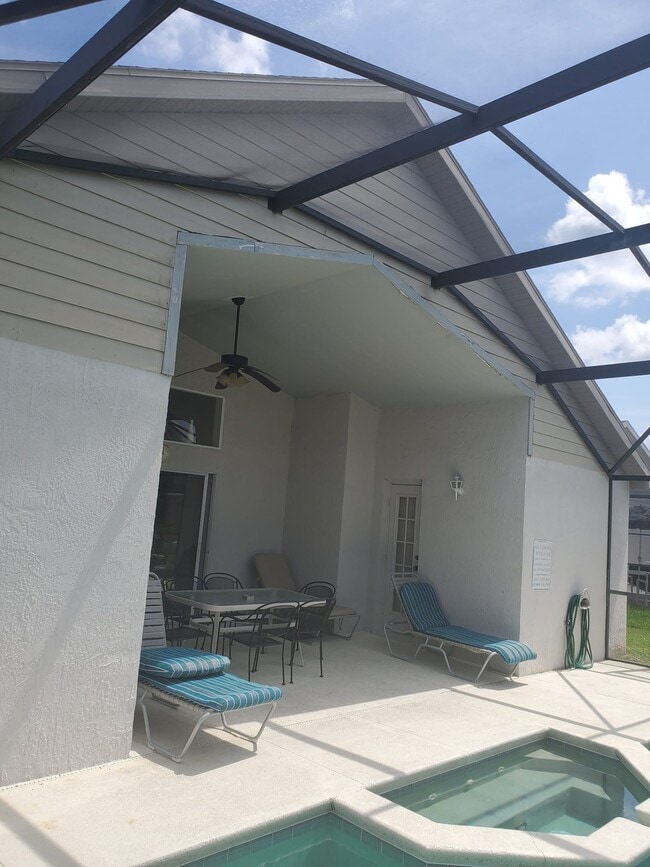 covered lanai at rear - 2651 Oneida Loop