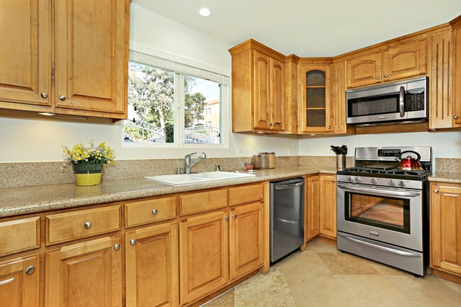 Microwave, Stove, DW & Cheery wood cabinets - 3424 Bellevue Ave