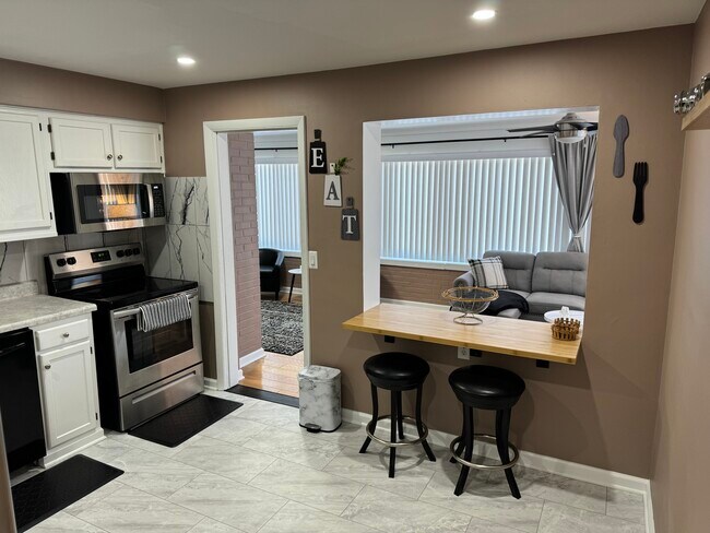 Photo - 22660 Lorain Rd Unit Upper 2