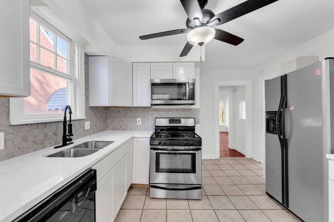 Photo - Spacious 4-Bedroom Cleveland Heights Home with Central Air & 2-Car Garage
