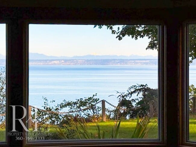 Building Photo - Waterfront Rustic Retreat with Vaulted Ceilings, Picture Windows & Lofted Nook