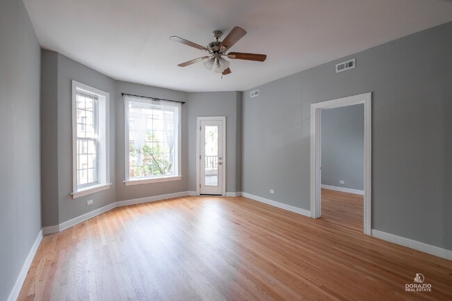Photo - Modern 4BR Apartment with Hardwood Floors, Balcony & Central A/C Unit 2